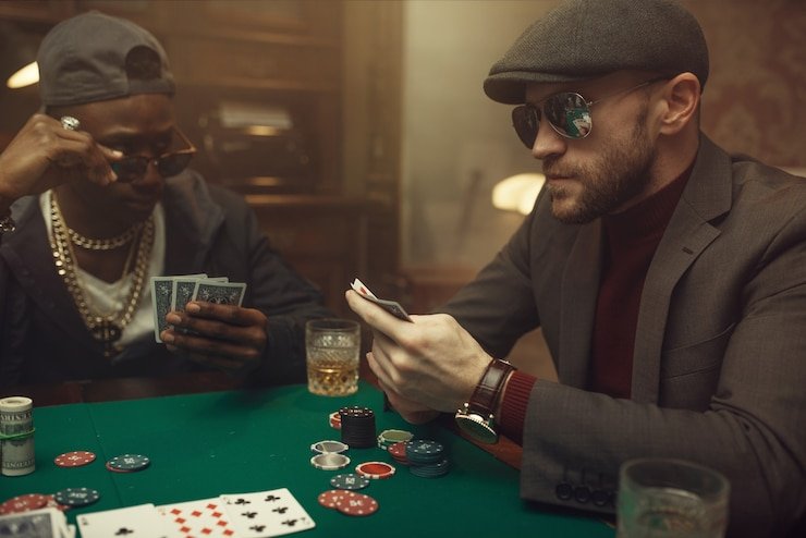 Live Caribbean Stud Poker dealer table at totojos188